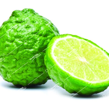 Whole and sliced fresh Kaffir Limes (Makrut)
